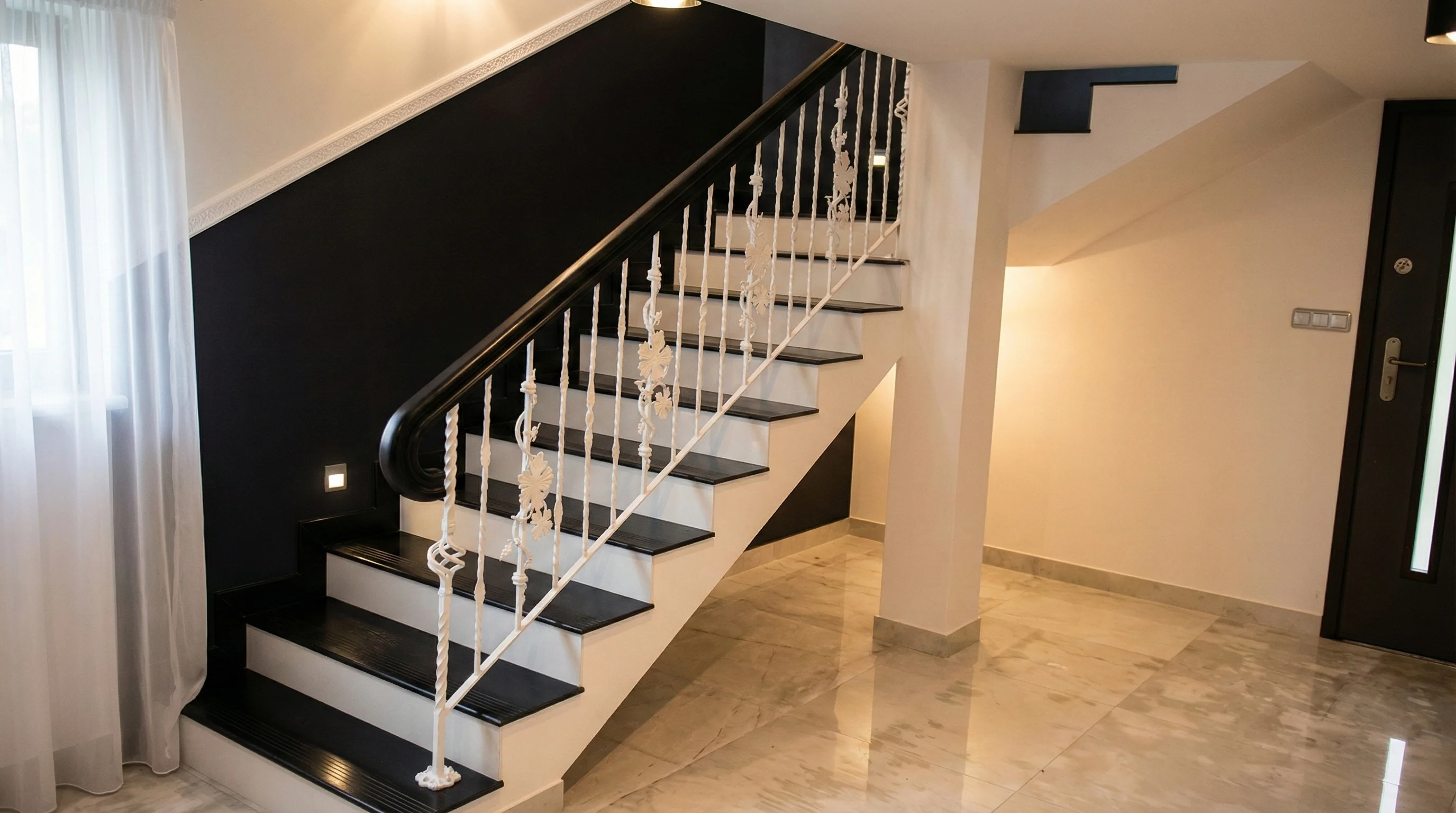 Czarne schody dębowe na beton w Rątach, widok z boku